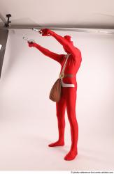 JOEL_ADAMSON CHRISTMAS VILLAIN WITH TWO GUNS